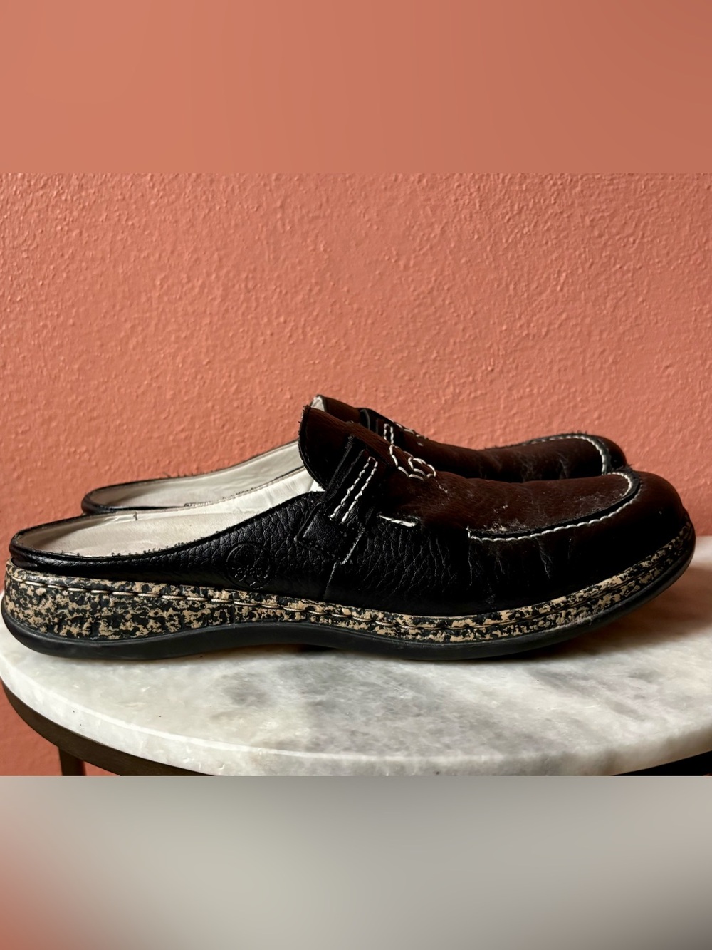 Rieker Black Slip-On Mule Loafers with Patterned Midsole